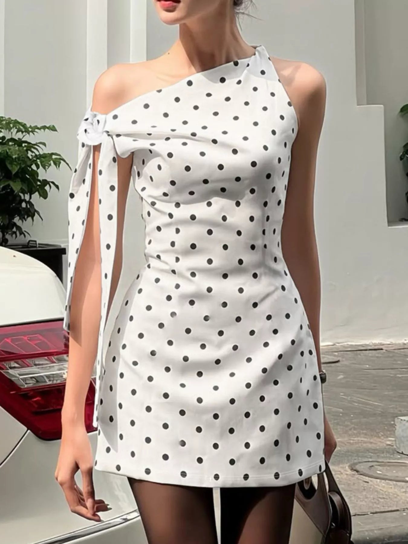 Polka Dot Sleeveless Mini Dress with Bow Accents