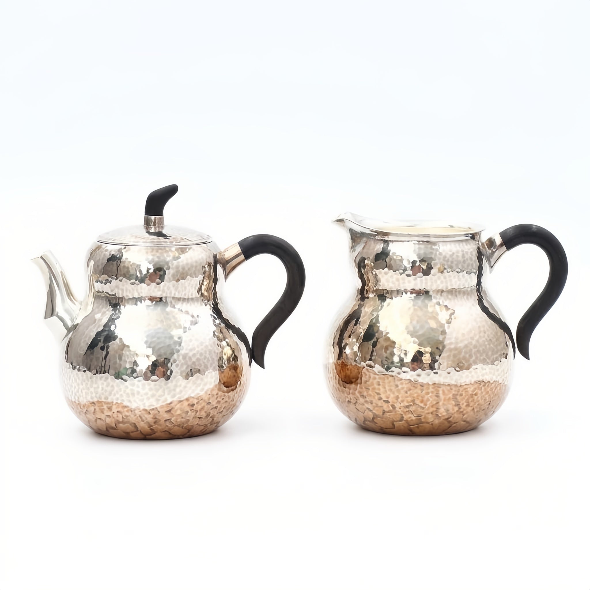 Pure 999 Fine Silver Hand-Hammered Silver Teapot and Creamer Set with Sleek Black Handles and Warm Metallic Accents - Handicraft