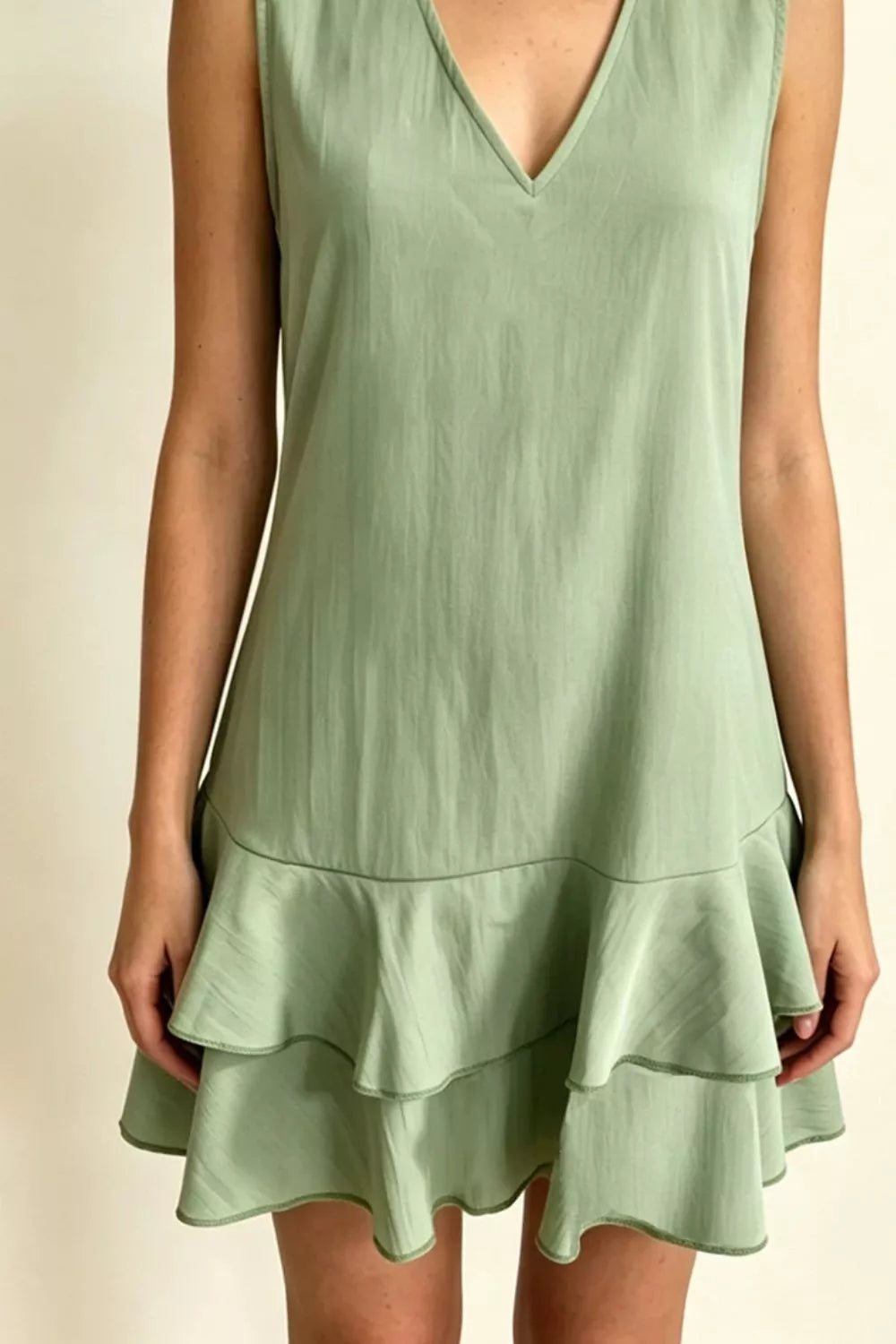 Full Size Sleeveless V-Neck Ruffle Hem Mini Dress Plus Size