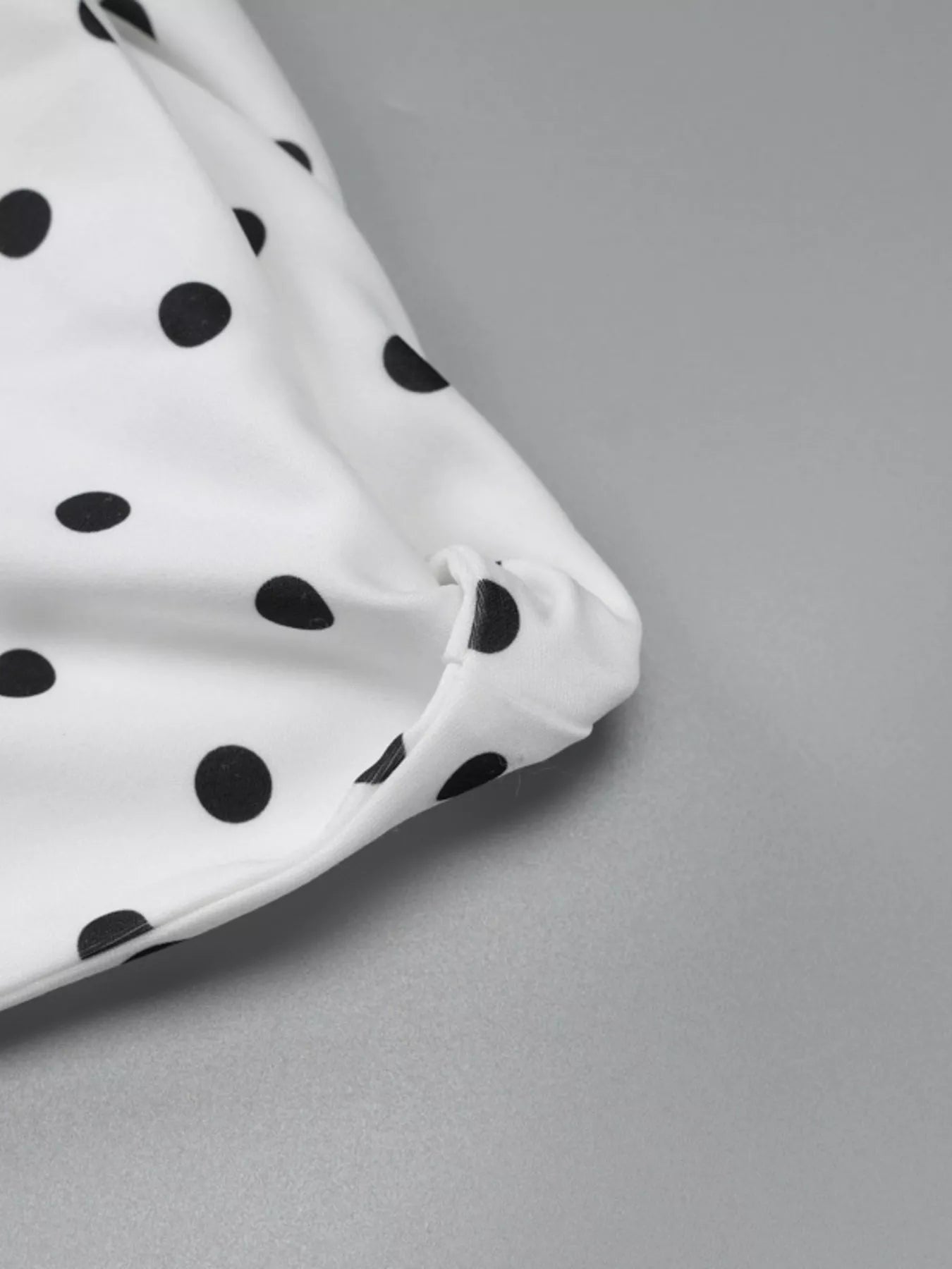 Polka Dot Sleeveless Mini Dress with Bow Accents