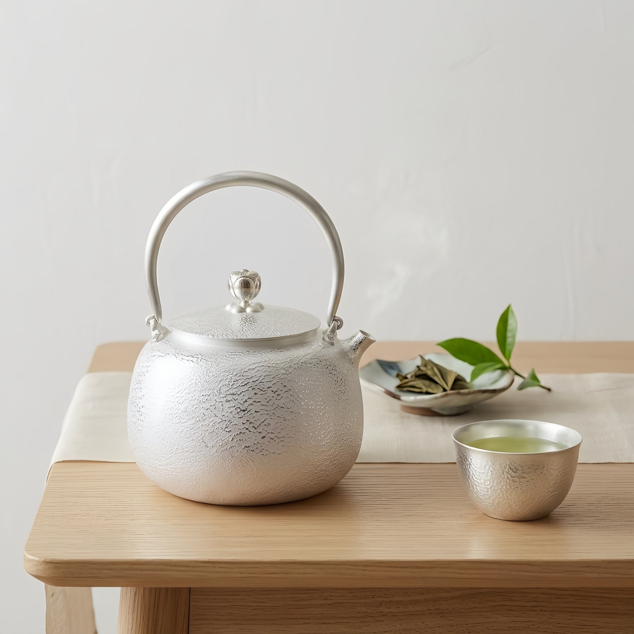 Pure 999 Fine Silver Handcrafted Fine Silver Teapot with Hammered Texture and Elegant Arched Handle - Handicraft