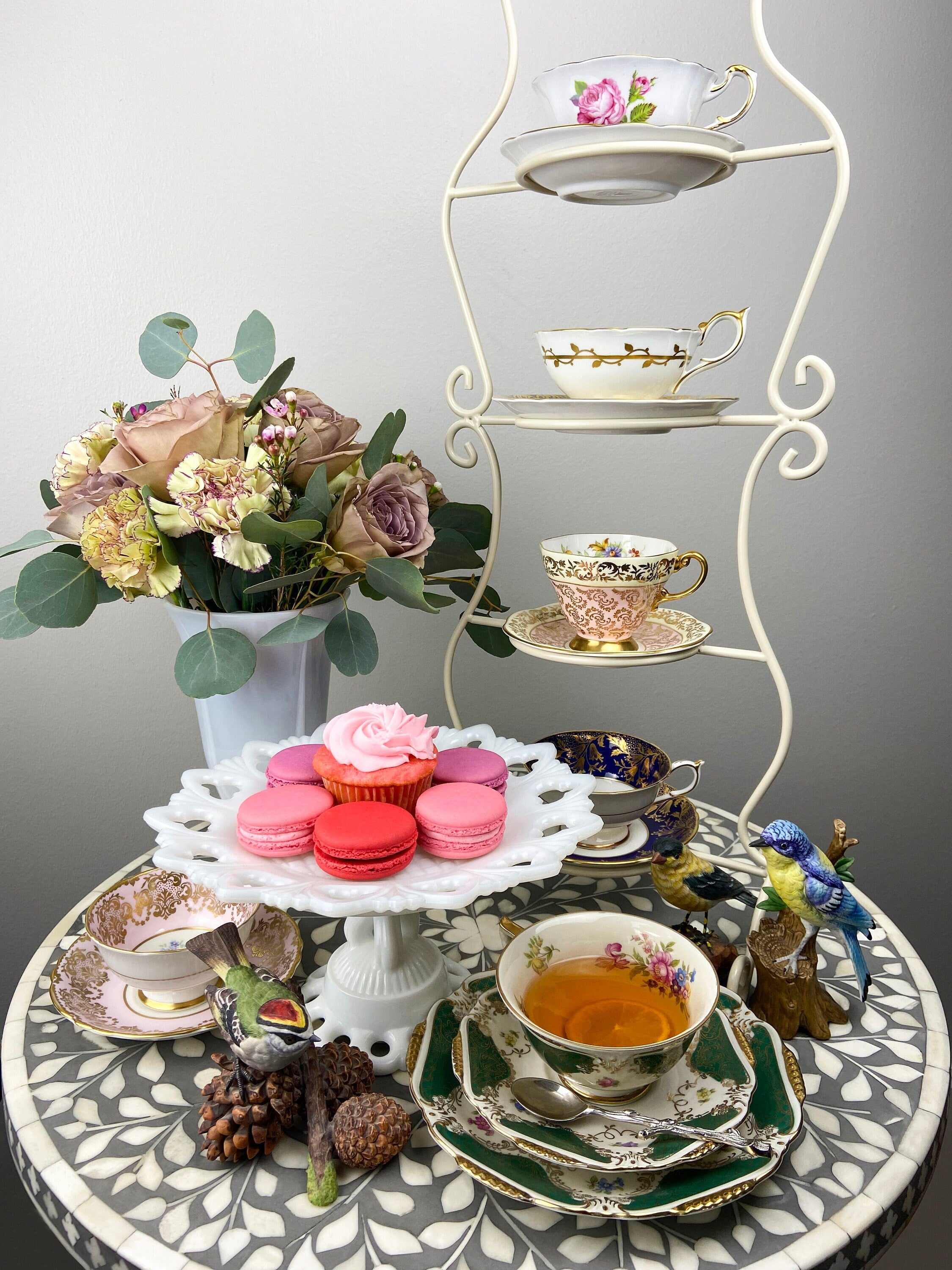 Royal Stafford Cup and Saucer. Black with Gold. Hand Painted Flower Bouquet Inside of Cup and on the Plate.