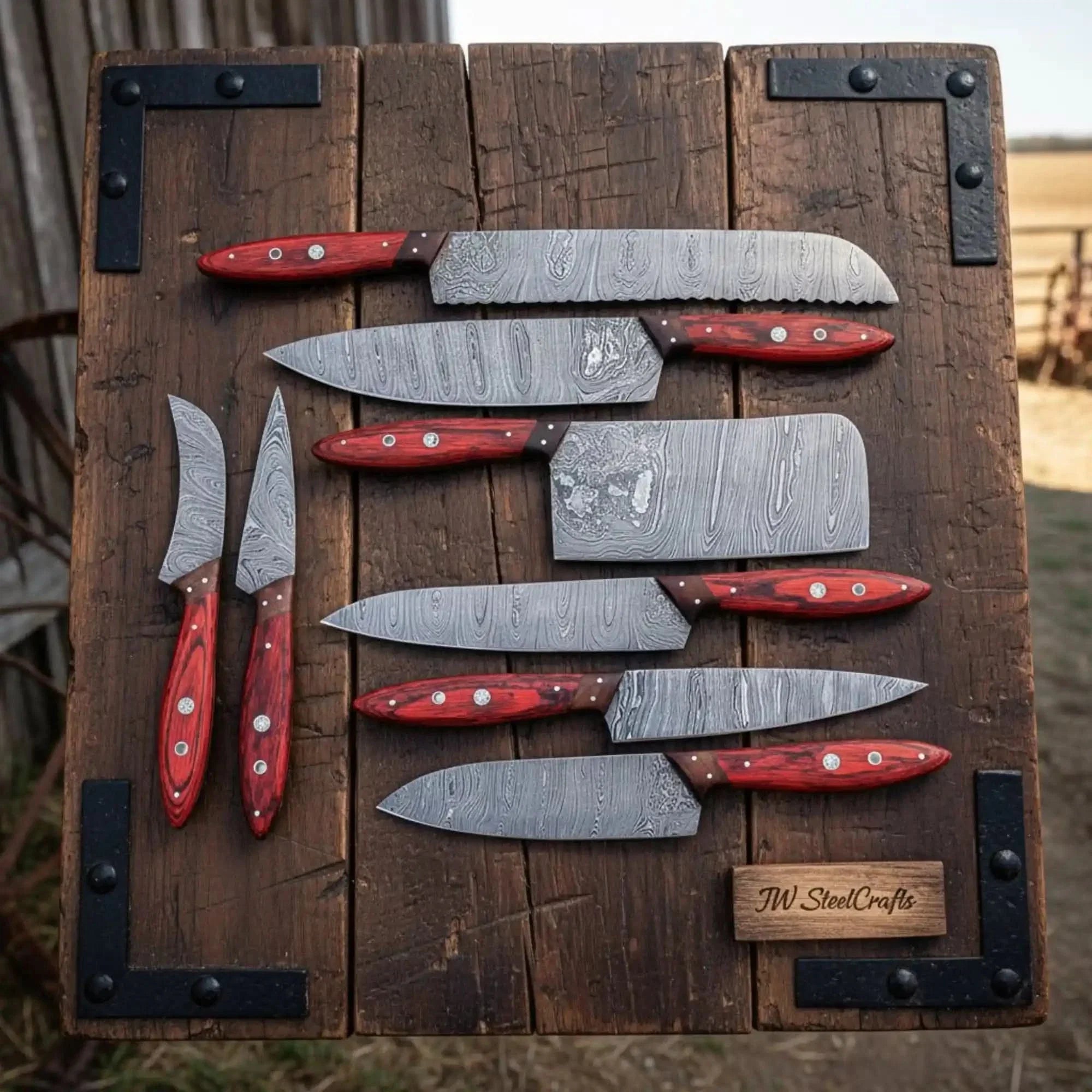 8 Piece Damascus Knife Set with Red Pakka Handles and Leather Roll