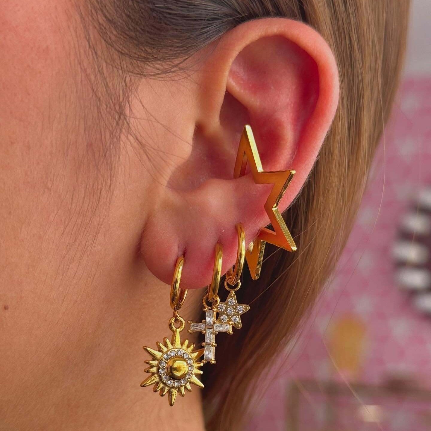 18k gold sun-shaped diamond-studded earrings with unique design