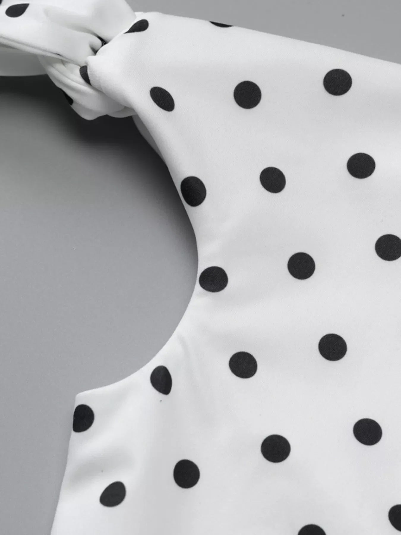 Polka Dot Sleeveless Mini Dress with Bow Accents