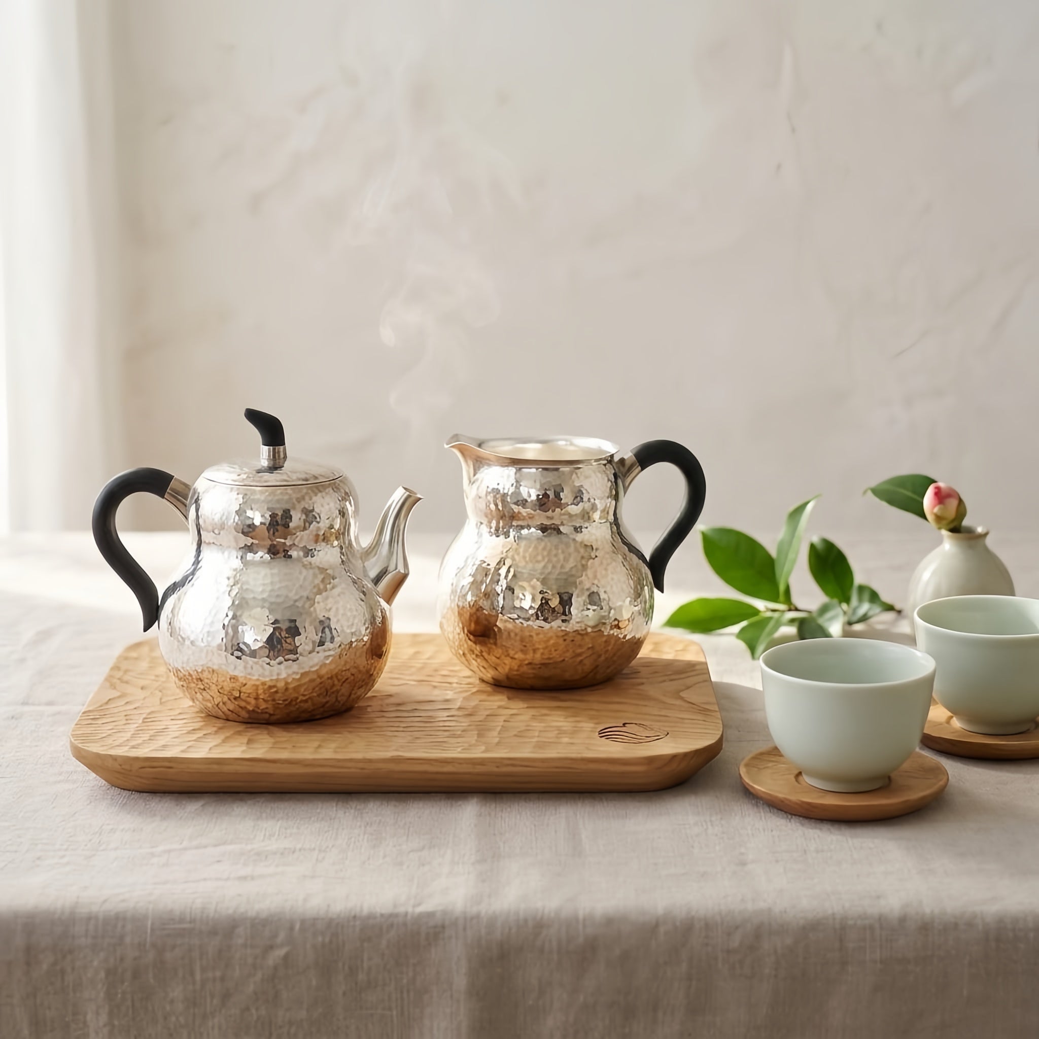 Pure 999 Fine Silver Hand-Hammered Silver Teapot and Creamer Set with Sleek Black Handles and Warm Metallic Accents - Handicraft