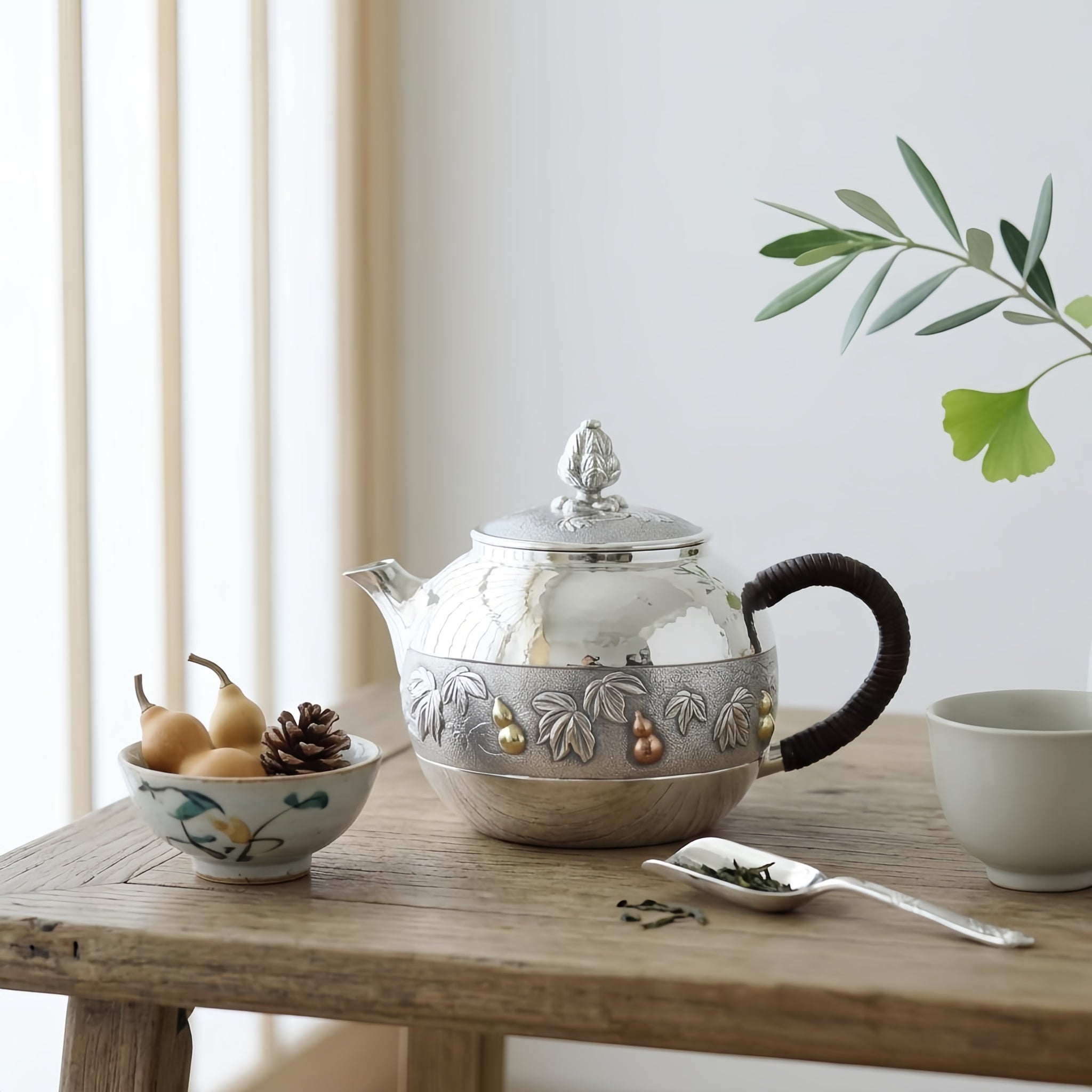 Pure 999 Fine Silver Handcrafted Silver Teapot with Embossed Leaf and Gourd Motifs and Woven Handle - Handicraft