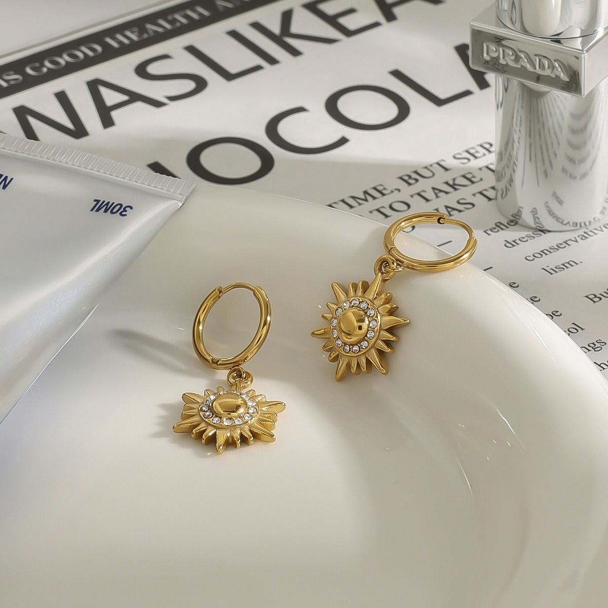 18k gold sun-shaped diamond-studded earrings with unique design