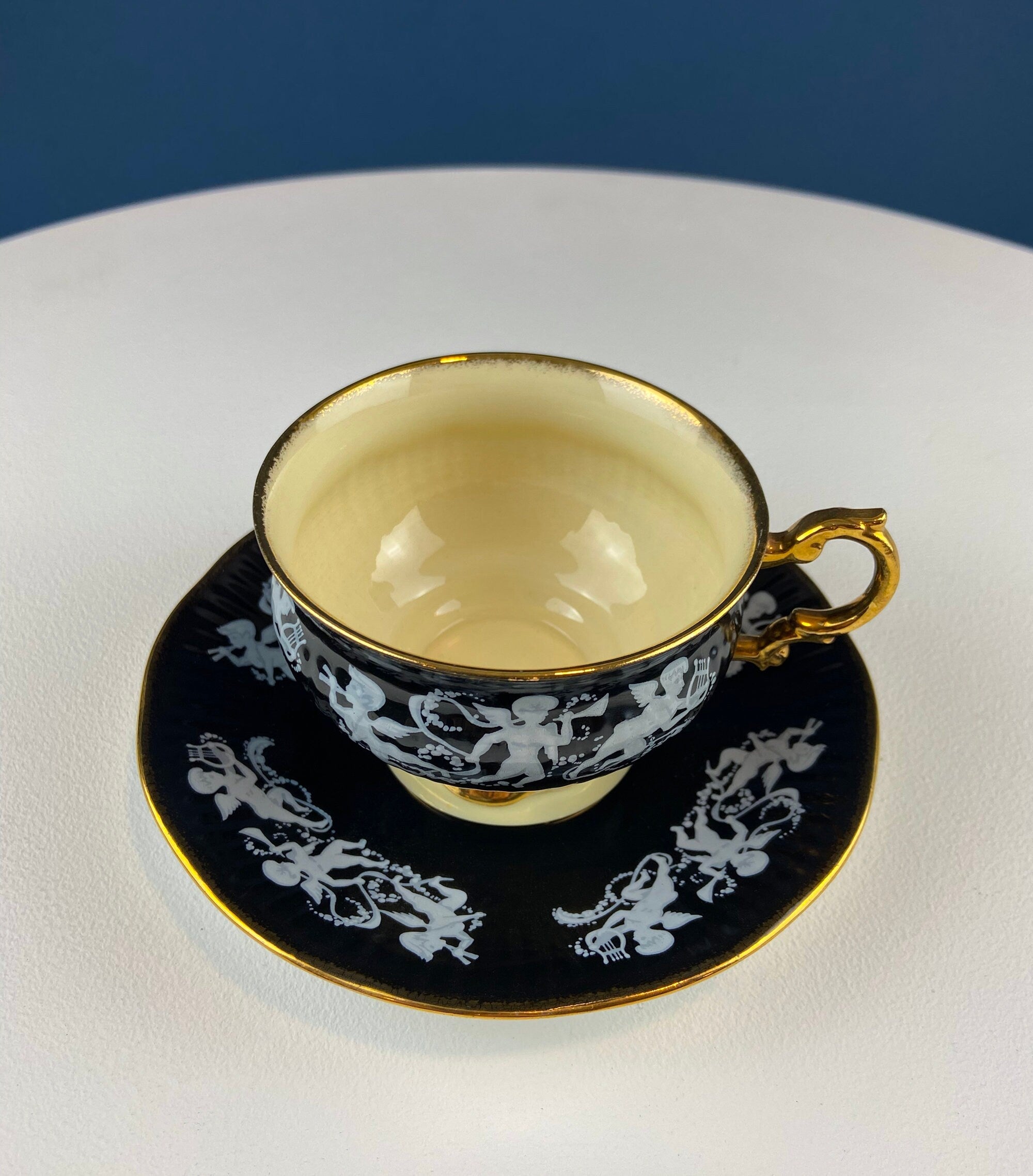 Vintage Elizabethan Fine Bone China Cup and Saucer: Handpainted Cupids