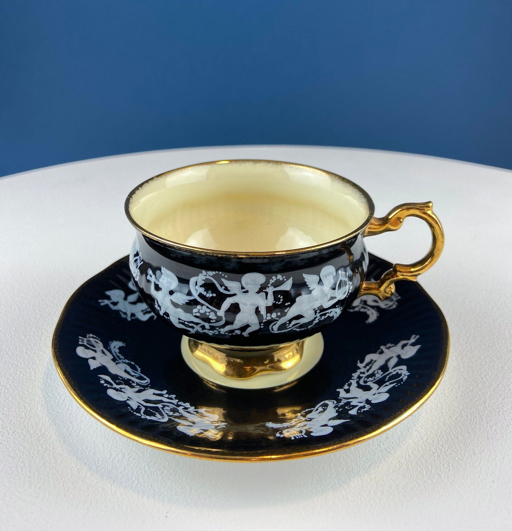 Vintage Elizabethan Fine Bone China Cup and Saucer: Handpainted Cupids