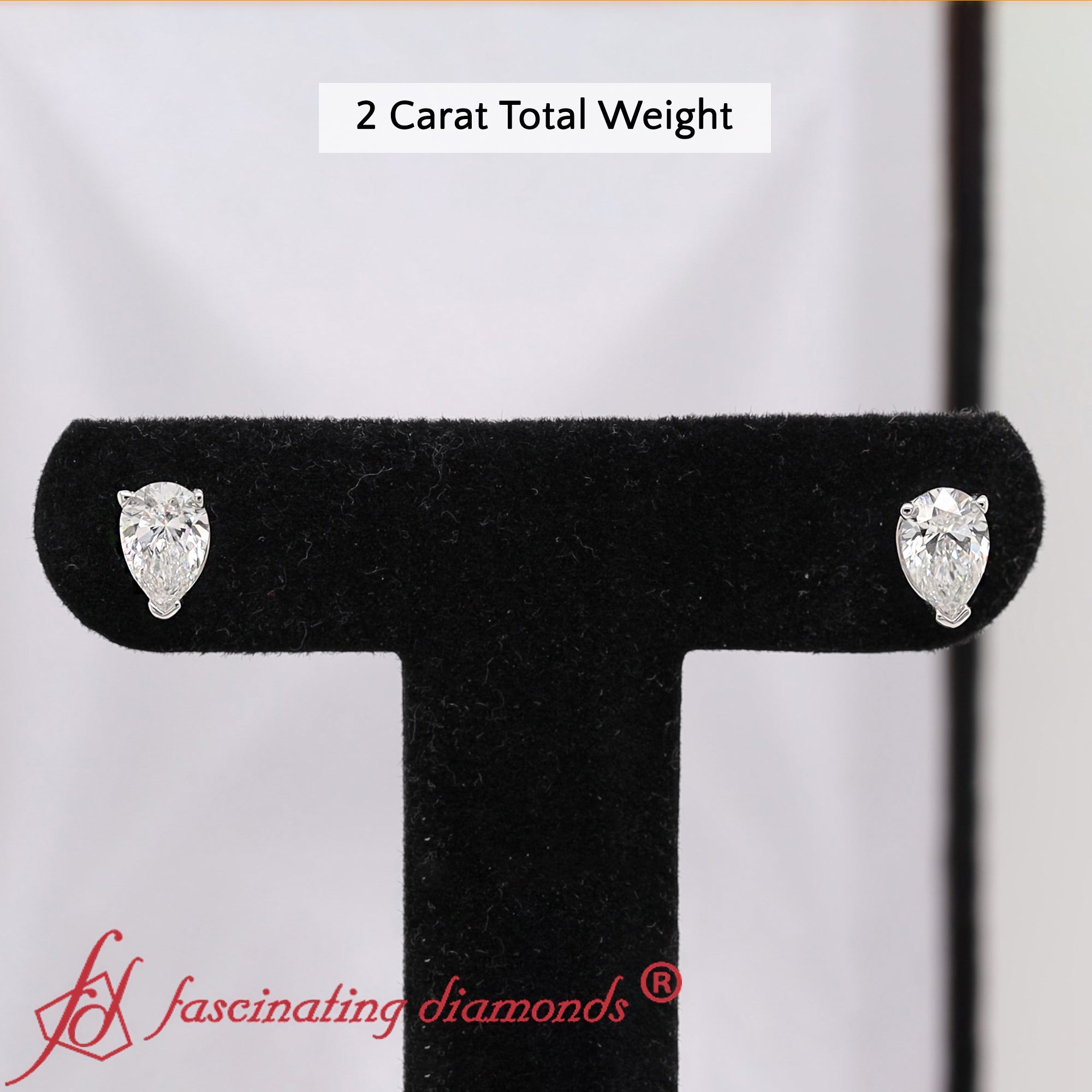 Three-Prong Pear Diamond Solitaire Stud Earrings [IGI Certified]